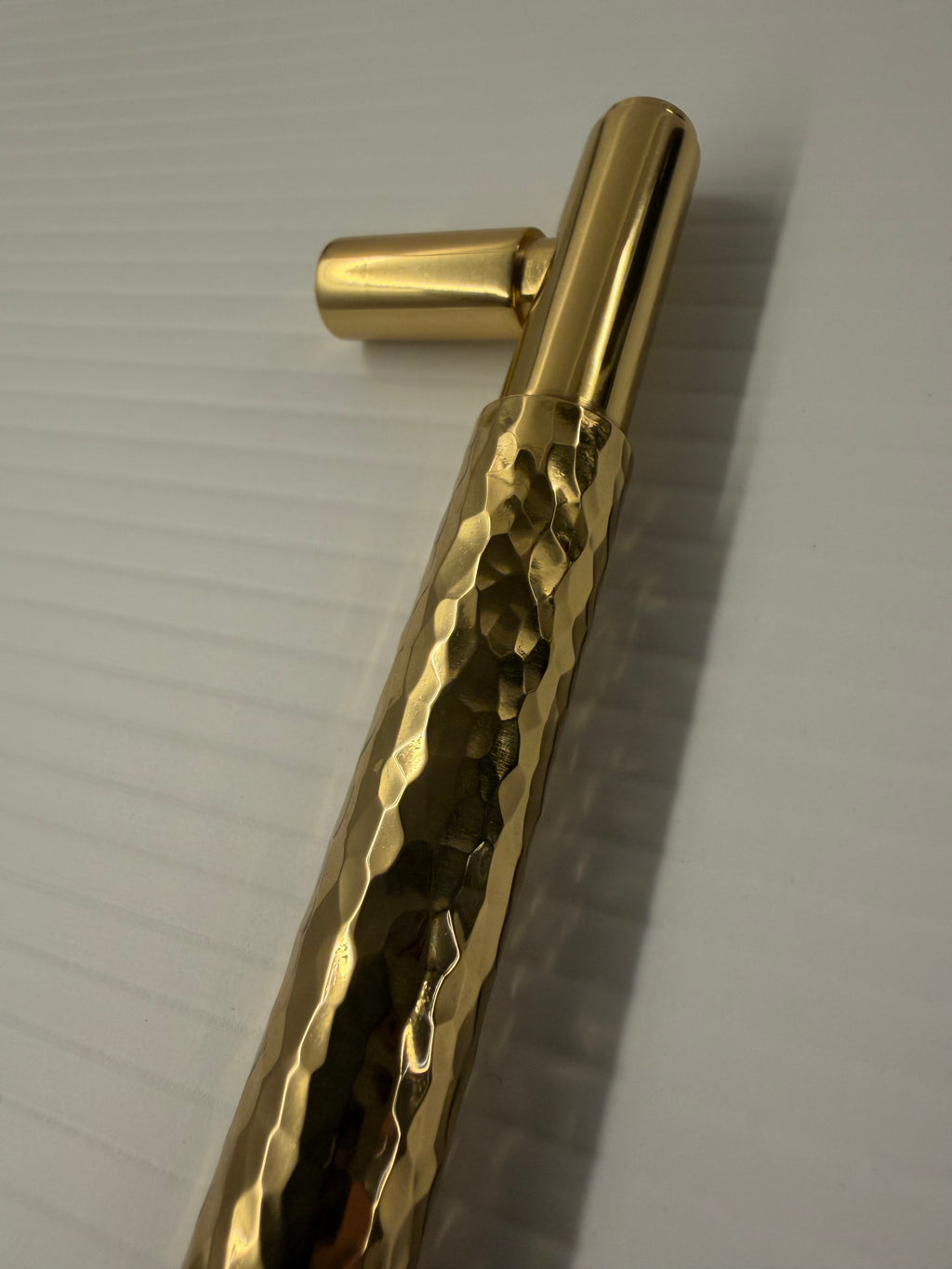 Premium solid brass kitchen cabinet handle installed on cabinet